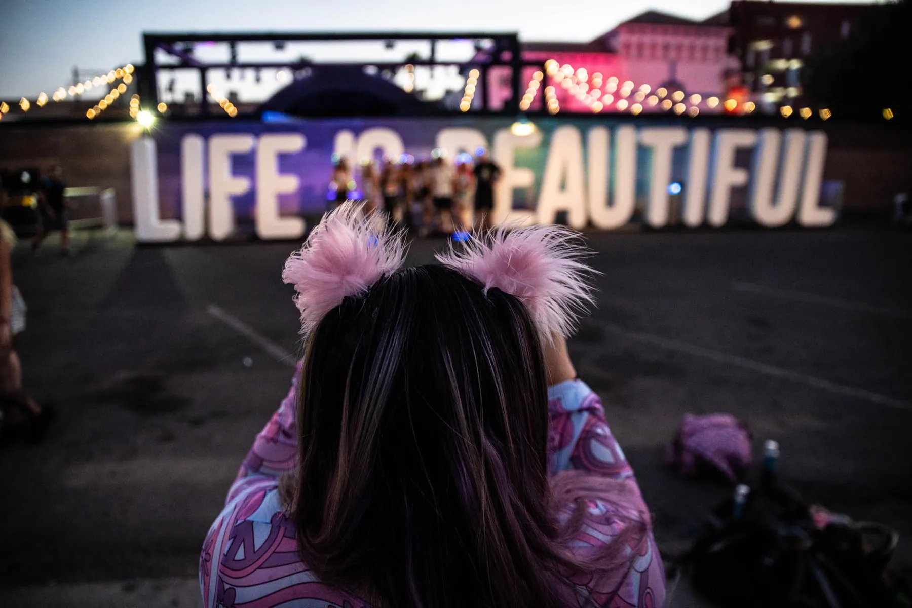 Life Is Beautiful festival in Downtown Las Vegas under colorful stage lights