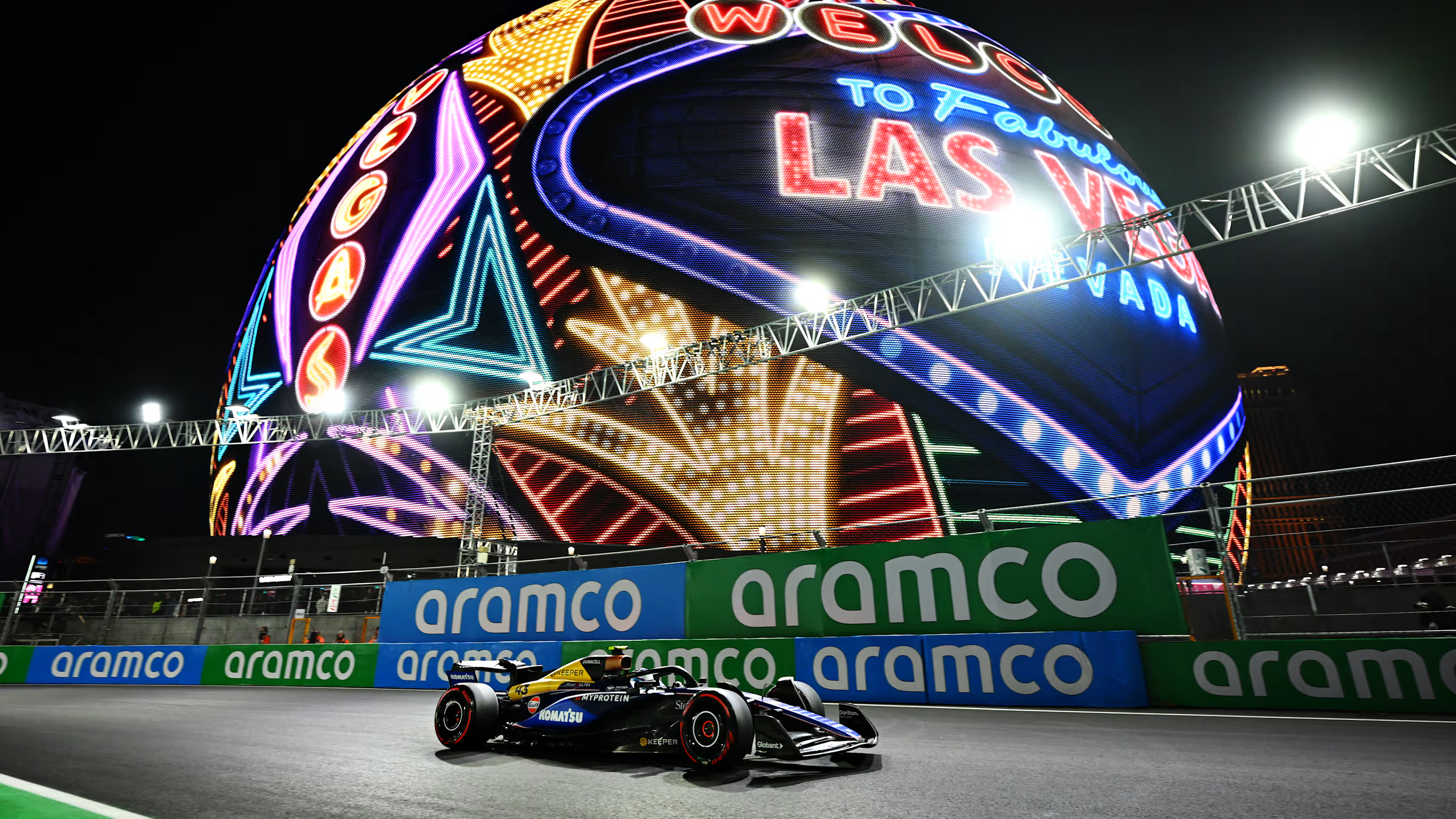 Formula 1 Las Vegas Grand Prix cars racing down the Strip at night