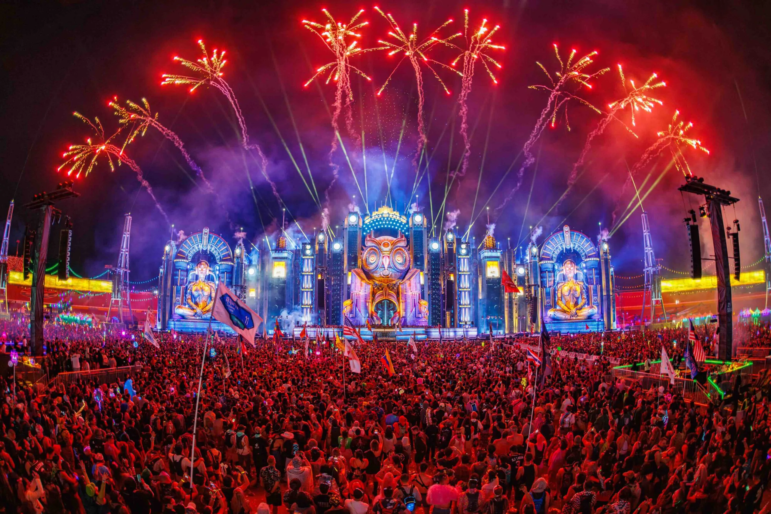 EDC Las Vegas kineticFIELD main stage at night, lit by pyrotechnics and lasers